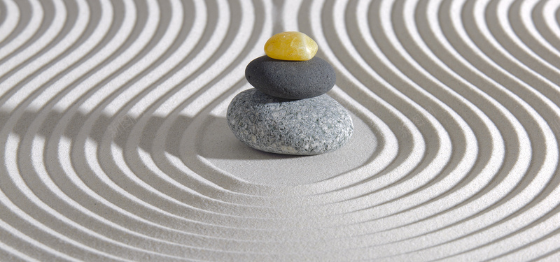 堆在沙子上的石头jpg设计背景_88icon https://88icon.com 创意 沙子 海报banner 石头 纹理 质感