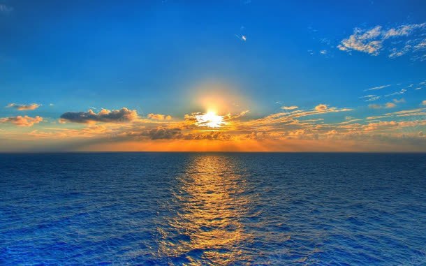 蓝天夕阳下的海水jpg设计背景_88icon https://88icon.com 夕阳 海水 蓝天