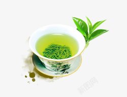 茶叶装饰茶杯中的西湖龙井茶高清图片