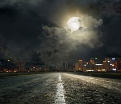 城市的灯光夜晚下的城市道路高清图片