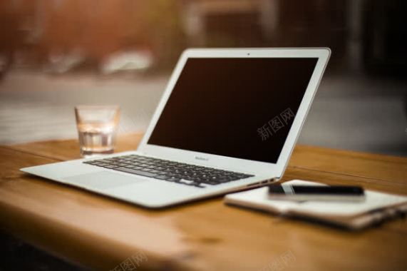 工作书台苹果笔记本电脑水杯背景