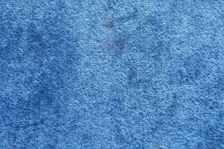 白毛绒地毯蓝色地毯背景高清图片