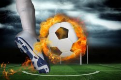 巴西世界杯草地上的火焰足球高清图片