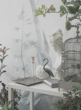 鸟笼自由塑像绿叶植物背景