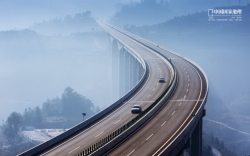 高速高架桥云雾中的高架桥高速公路海报背景高清图片