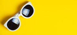 黄色太阳镜简约大气现代眼镜海报背景高清图片