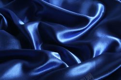 蓝色绸子柔软的丝绸背景高清图片