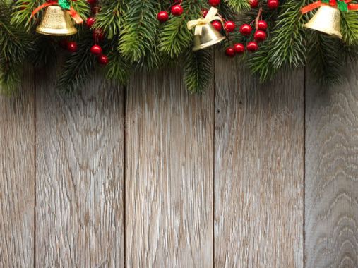 圣诞节铃铛与木板背景
