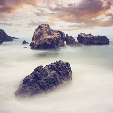 海边岩石背景摄影图片