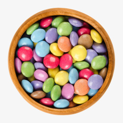 药品封面木碗里的彩色糖果俯视图高清图片
