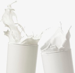 白色纯牛奶两杯碰撞牛奶高清图片