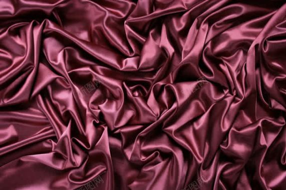 紫红色丝绸布料护肤品背景背景