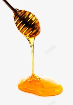 蜂蜜滴落创意搅棒上滴落的蜂蜜高清图片