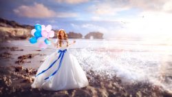海边婚纱套图蓝红色气球婚纱照海边高清图片