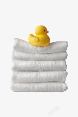 丑小鸭的黄色玩具在白色层叠毛巾上的橡胶高清图片