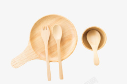 喂养勺叉子木碟子上的勺子和叉子和碗饭勺高清图片