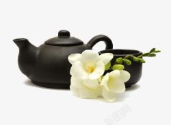 黑色的茶壶和茶杯泡茉莉花茶素材