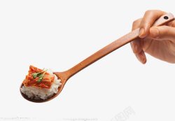 米饭勺手勺起来的米饭高清图片