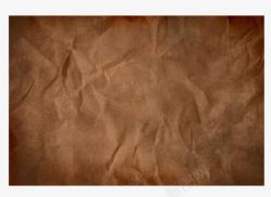 深棕色牛皮纸褶皱纹理背景素材