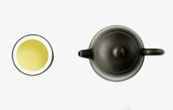 黄色茶汤茶壶与茶杯高清图片