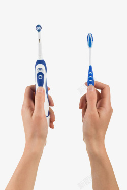 电动牙刷实物手拿着电动牙刷和手动牙刷实物高清图片