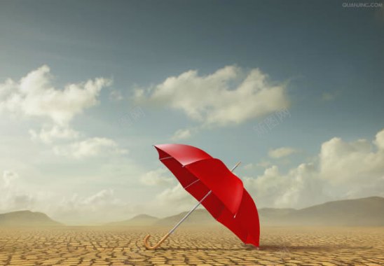 蓝天白云沙漠里的小红伞背景