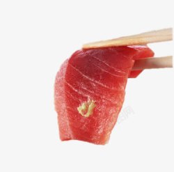 鱼肉块筷子夹起的金枪鱼块高清图片