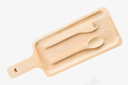 木质工具木质砧板上的勺子和叉子高清图片
