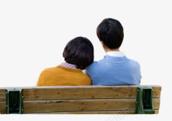 坐着女人坐在长椅上相互依偎的人物背影图高清图片