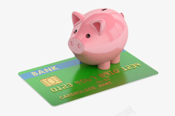 绿色贷记卡被粉红小猪压着实物素材
