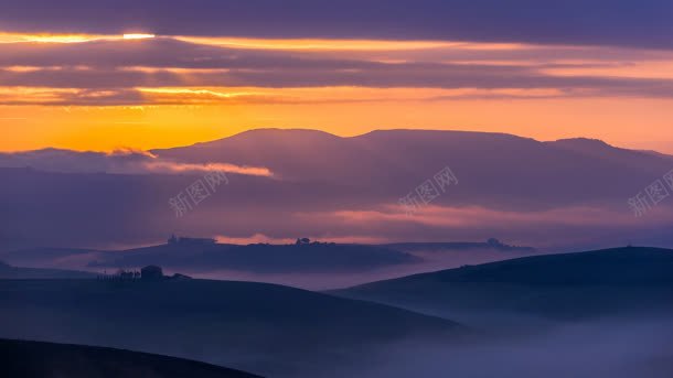 蓝色天空夕阳山峰背景