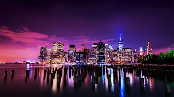 紫色夜空灯火通明的城市海报背景背景