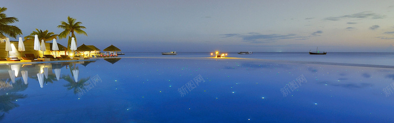 海边灯光夜景背景摄影图片
