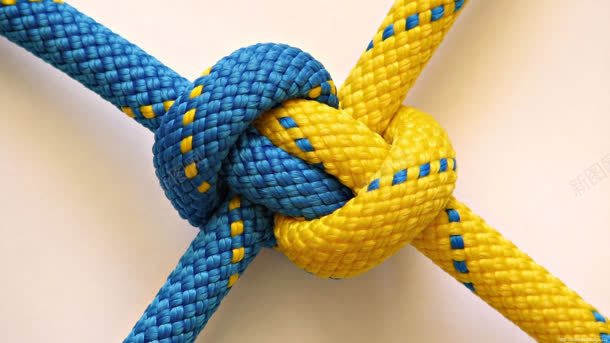 黄蓝色的麻绳缠在一起背景