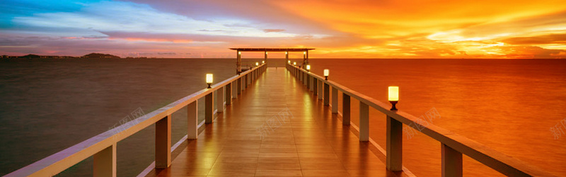 夕阳晚霞木桥背景摄影图片