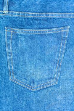 蓝色牛仔布纹背景图片蓝色牛仔裤裤包高清图片