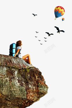 座在岩石上看海欧的男孩素材