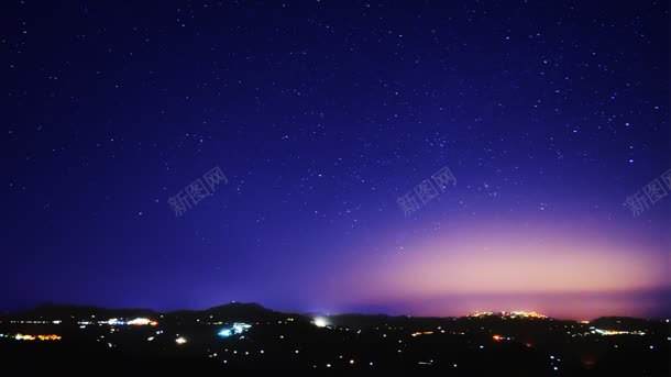 蓝色星空城市日出背景