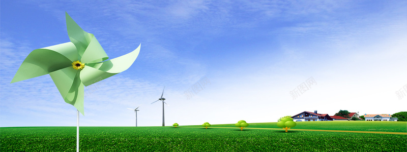 草地上的绿色纸风车背景背景