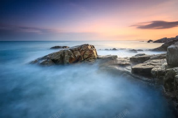 唯美黄昏海洋岩石背景