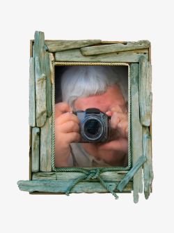 隐藏拍照按钮在木框里偷拍的人高清图片