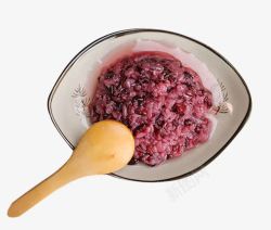 醪糟盘子里的紫米醪糟高清图片