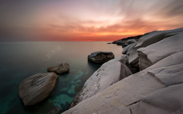 夕阳海上岩石宽屏背景