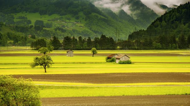 黄色山峦下的农田jpg设计背景_88icon https://88icon.com 农田 山峦 黄色