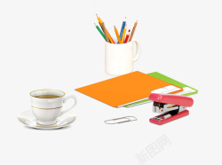 橙色书本铅笔筒咖啡订书机素材