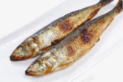 巫山盘子里的2条烤鱼高清图片