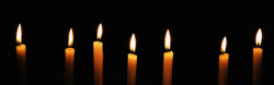 蜡烛摄影黑色蜡烛烛光背景高清图片