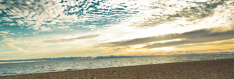 蓝天白云南方海边沙滩背景图背景