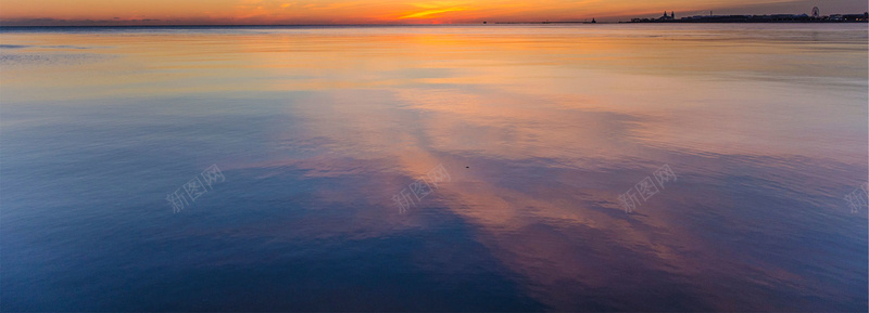 浪漫夕阳海平面背景背景