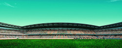体育场的观众大气足球场观众席蓝天体育场足球赛事高清图片